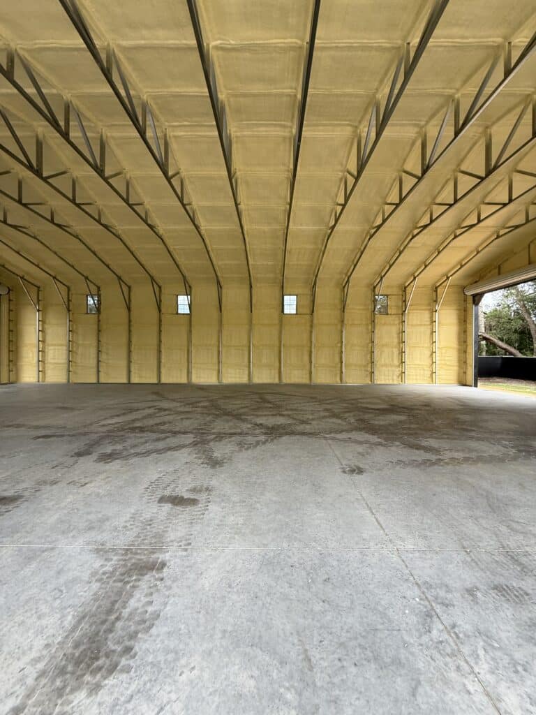 Metal building spray foam insulation interior - complete coverage on walls and ceiling